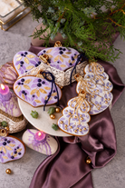 Lavender and gold Christmas cookies made with the Prop Options x Ekat's cookie set