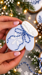 Blue mitten cookie held in hand, Prop Options x Ekat's Christmas cookie set